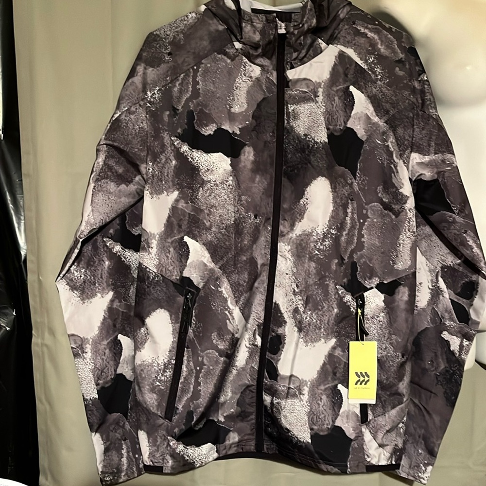 Brand new “all in motion” size small light, rain, jacket,size small